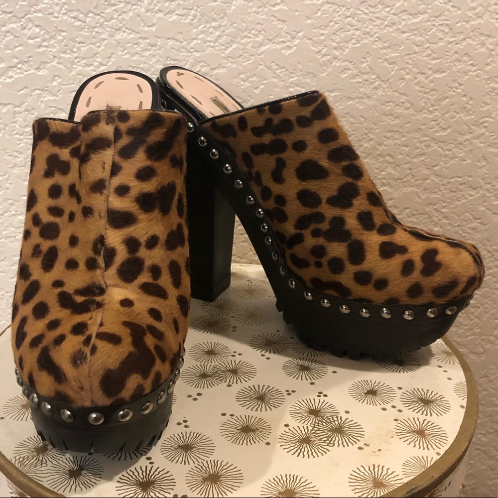 Miu Miu ponyhair cheetah print platform clogs